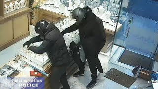 Dramatic smashandgrab robbery at west London jewellers is caught on CCTV [upl. by Iramaj]