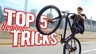 TOP 5 EASIEST WHEELIE TRICKS FOR BEGINNERS [upl. by Bartolemo]