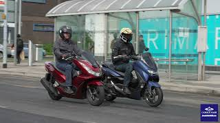 2021 Honda PCX 125 v Yamaha NMAX 125 Scooter comparison test [upl. by Brig]