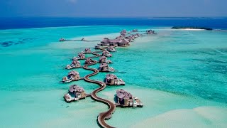 Maldives 4K  Beautiful relaxing music  surreal drone footage [upl. by Marcos]