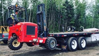 LOADING MOFFETT PIGGYBACK ON FLATBED TRAILER [upl. by Knudson]