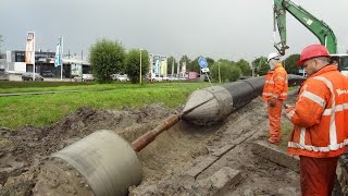 Pulling in a main sewer pipe  rioolbuis trekken [upl. by Ahsietal722]