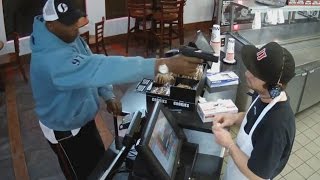 Watch Unfazed Cashier Keep His Cool During Terrifying Gunpoint Robbery [upl. by Nahama]