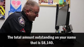 Watch Police Officer Hilariously Play Along With IRS Scammer [upl. by Ellecram]