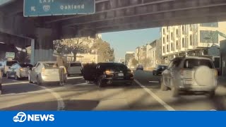 CAUGHT ON CAMERA Driver robbed while in San Francisco traffic near I80 onramp [upl. by Kilby]