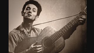 Woody Guthrie Biography [upl. by Annatnom240]