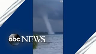 Giant waterspout forms over lake in Canada [upl. by Gosser]